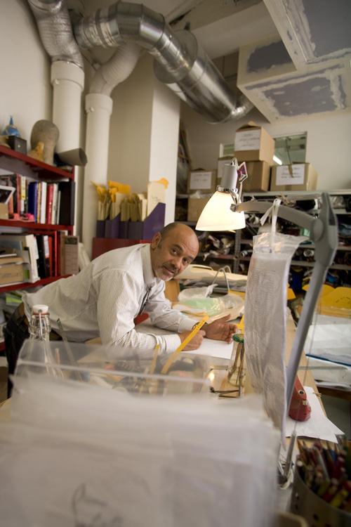 Christian Louboutin in workshop